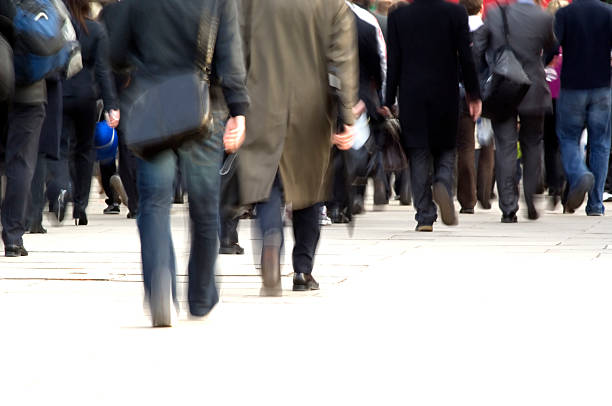 istock Crowd of commuters feet, movement blur 171136609