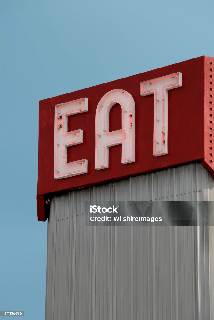 Old Neon Eat Sign  Building Exterior Stock Photo