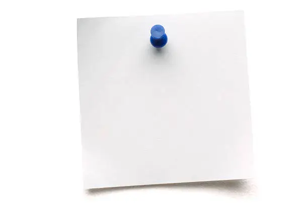 Blank note paper with blue push pin, isolated on white