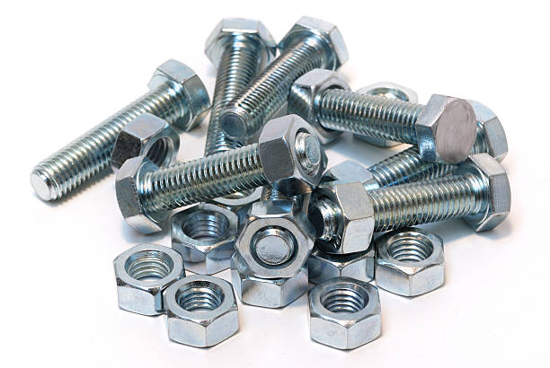 istock Steel nuts and bolts isolated on white 171136920