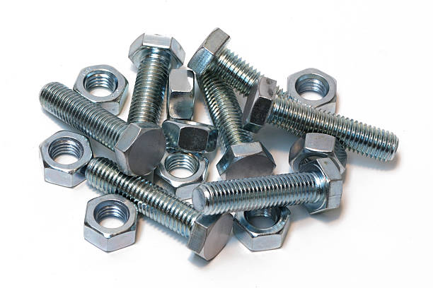 istock Zinc plated nuts and bolts isolated on white 171136923