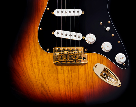 Electric guitar Fretboard closeup macro slider shot. Guitar pegs on a six-string guitar. musical instrument