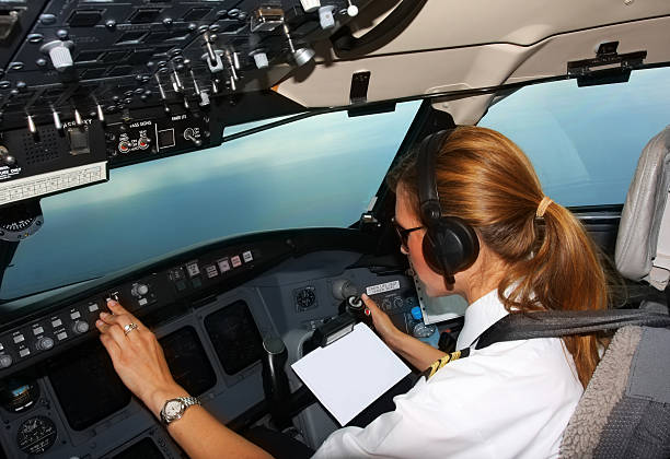 istock Beautiful young woman pilot at work 171136983