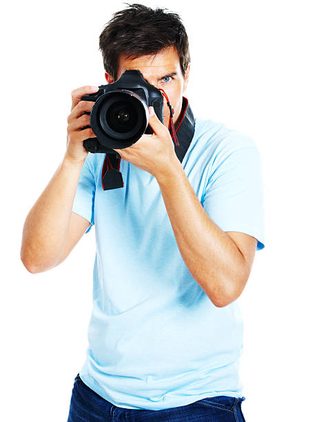 istock Young man clicking photo from camera 171137315