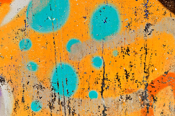 graffiti orange y verde. - abstract art painted image surrounding wall fotografías e imágenes de stock