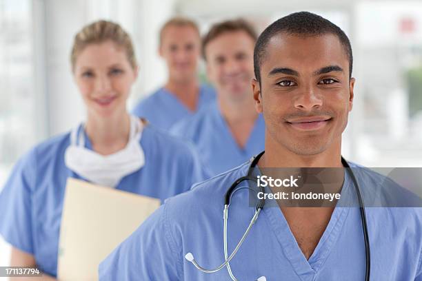 Equipo Médico Foto de stock y más banco de imágenes de Asistente de Enfermera - Asistente de Enfermera, Compañero de trabajo, Fondo blanco