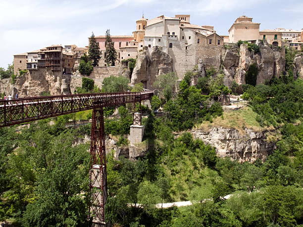 The medieval town of Cuenca is built on a rocky outcrop at the Hoz de Huecar, a gorge formed at the join of the Jucar and Huecar rivers in La Mancha province of Spain.