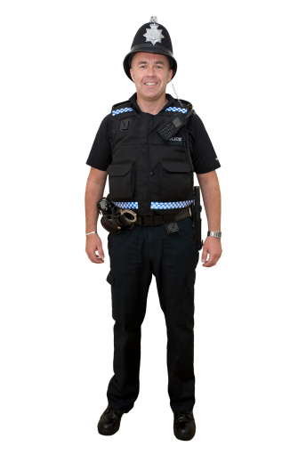 An authentic police officer. Isolated on a pure white background.