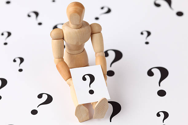 istock Wooden mannequin with a question mark. 171138044