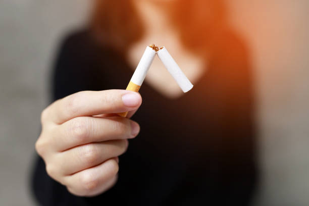 woman refusing cigarettes concept for quitting smoking and healthy lifestyle.or No smoking campaign Concept. stock photo