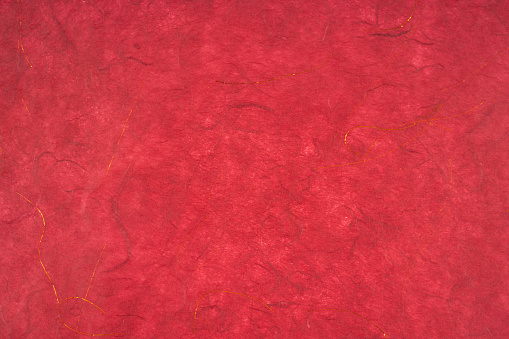 Red color mulberry paper texture as background for DIY, Art and Craft.