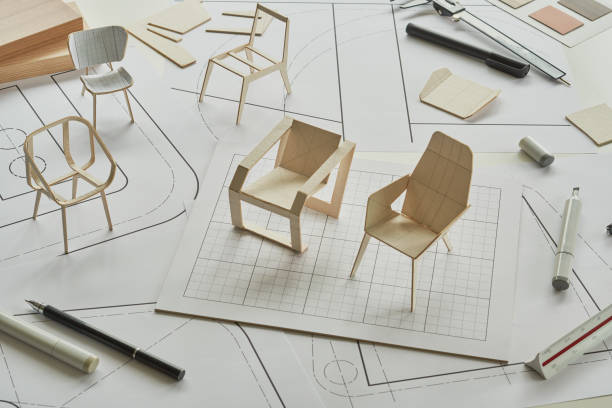 istock Designer sketching drawing design development product plan draft chair armchair Wingback Interior furniture prototype manufacturing production. designer studio concept . 1711403131