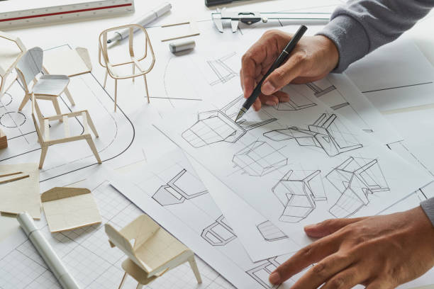 istock Designer sketching drawing design development product plan draft chair armchair Wingback Interior furniture prototype manufacturing production. designer studio concept . 1711403140