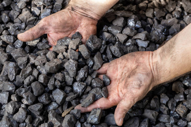 istock hands digging into coal, industrial mining concept, coal prices, energy cost for households and industry 1711405444
