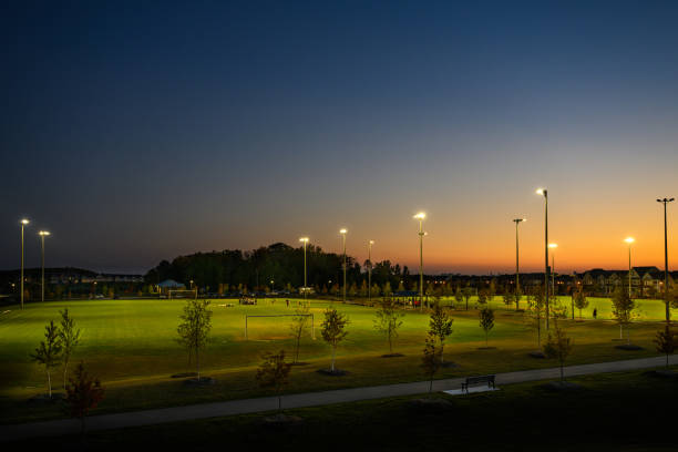 Junior teams training in illuminated soccer fields at a new community sport park in Markham, Ontario, Canada