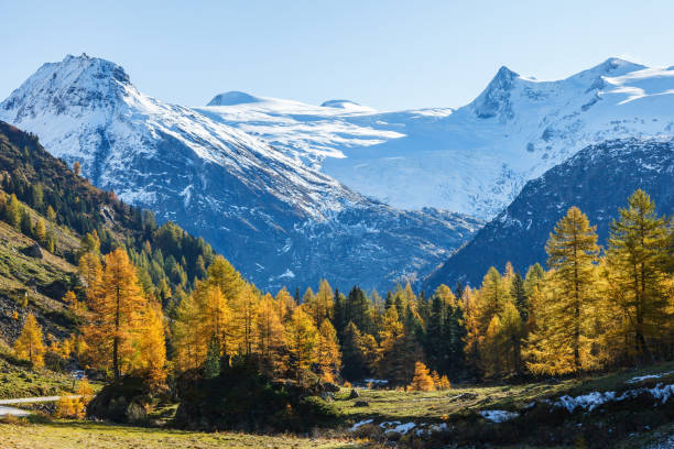 istock Scenic view at snow capped mountains in autumn 1711413014
