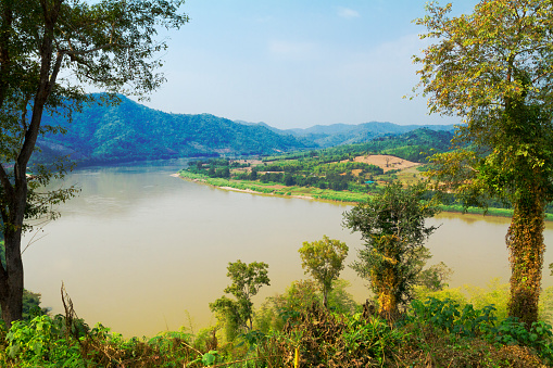 Panorama of Mekong river and border to Laos seen from PHRA YAI PHU KHOK NGIU พระใหญ่ภูคกงิ้ว platform in Loei province