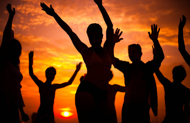 Young People Enjoying a Summer Beach Party