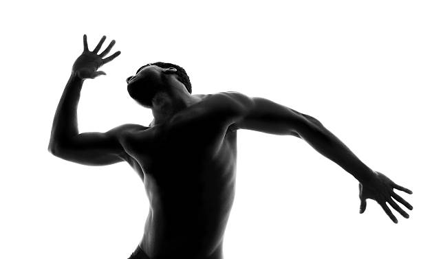 dançarino com iluminação - shirtless strength sensuality black - fotografias e filmes do acervo