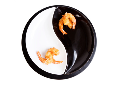 Delicious fried shrimp on a plate of yingyan, isolated on white.More images in: