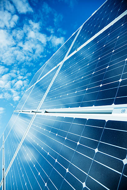 Solar Panels Against Blue Sky stock photo