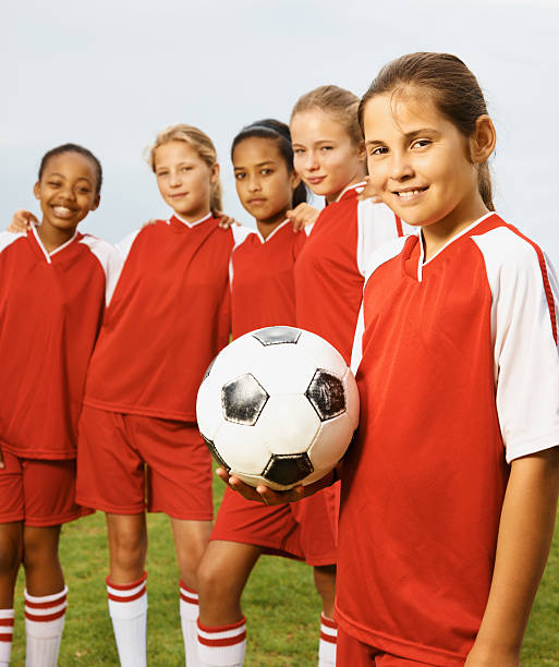istock Team with their captainholding a soccer ball 171144258