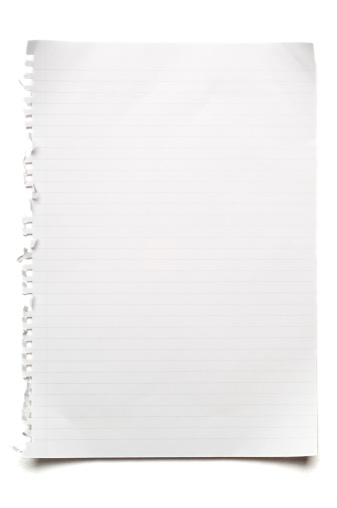 A lined sheet of paper, ripped out of a notebook. Isolated on white.