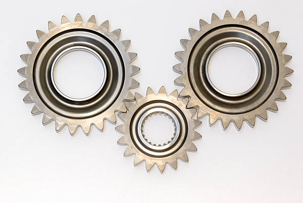 istock Three steel automobile gears isolated 171144800