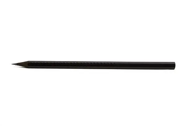 close-up of a black pencil isolated on white