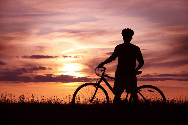 istock Man With His Bicycle by Sunset 171144960
