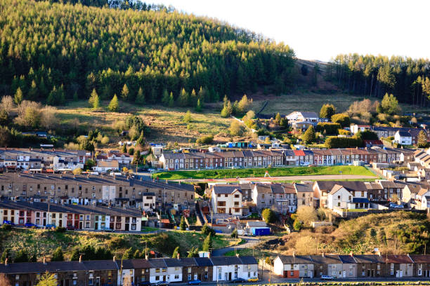 Terraced houses in Rhondda, Wales Terraced homes near Treorchy, Rhondda valley, Wales in the evening sun welsh culture stock pictures, royalty-free photos & images