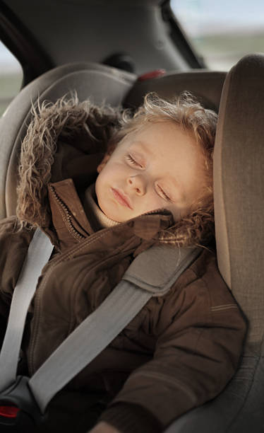 istock Little Boy Sleeping in the Child Seat 171145727