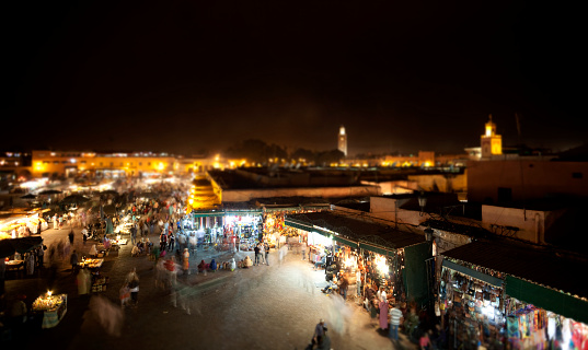 Looking across the Djemaa el-Fna in Marrakesh. The hustle & bustle is accentuated by a long exposure and selective focus.