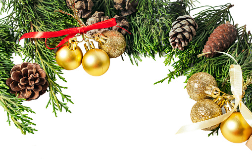 Pine twigs and Christmas decorations isolated on white or transparent background cutout.