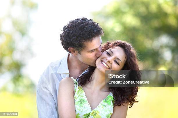 A Beautiful Young Couple Hugging And Kissing Stock Photo - Download Image Now - Adult, Adults Only, Affectionate