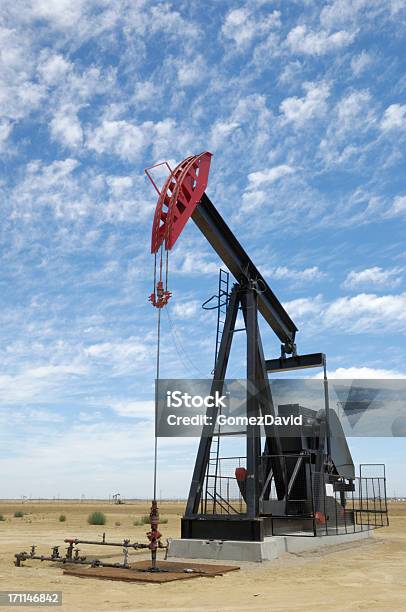 Oil Pumpjack With Clouds In Background Stock Photo - Download Image Now - Oil Pump, Borehole, California