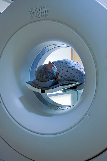 A male patient receiving a medical cat scan stock photo
