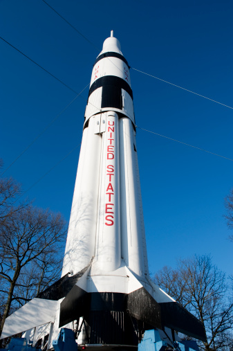 A Saturn V rocket welcomes travellers to Alabama at an interstate highway rest stop near Huntsville.