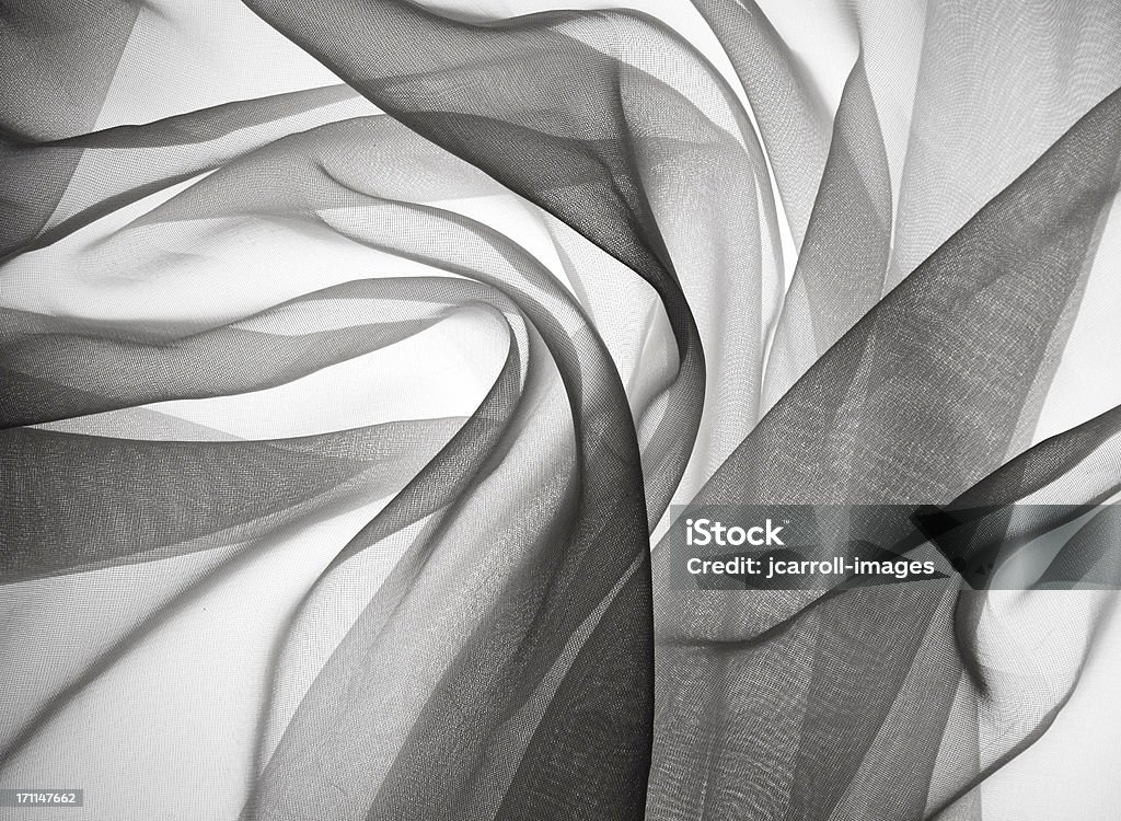 smoky gauze fabric Gauze fabric backlit creates a sensual, smokey feel Textile Stock Photo