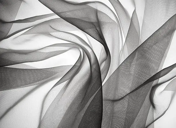 Gauze fabric backlit creates a sensual, smokey feel