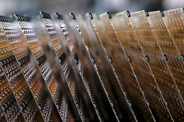 Close up of circuit boards on assembly line stock photo