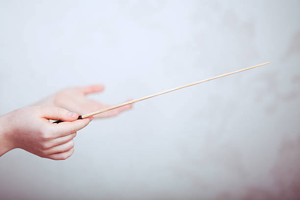 Conductor Female hands holding conducting baton.Please see similar image: conductors baton photos stock pictures, royalty-free photos & images