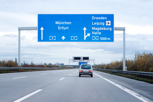 Road sign on german autobahn/motorway, minor motion blur
