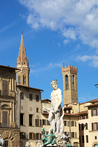 Florence, Italy - 22 Nov, 2022: Basilica of San Lorenzo and Statue of Giovanni de Medici