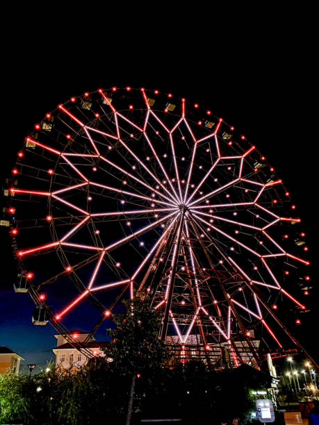 istock Ferris wheel at night in the city 1711482644