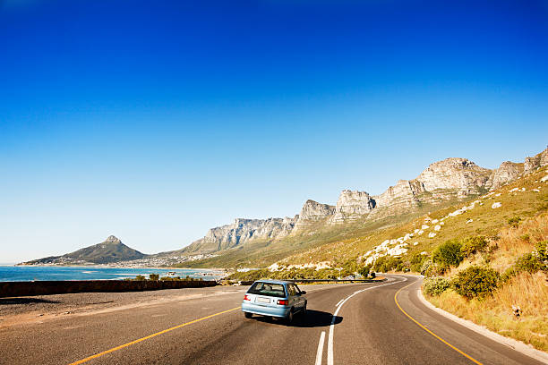 istock Driving past Table Mountain's Twelve Apostles cliffs along coast road 171148656