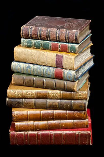 A pile of antique books Bound in leather blank Spines