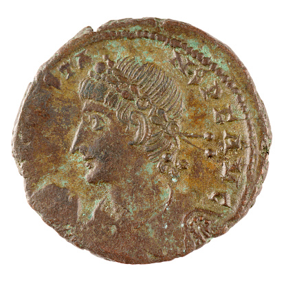  A bronze Roman coin from the reign of Emperor Constantius II, 348 AD. The coin is about the size of a penny and weighs 3.9g