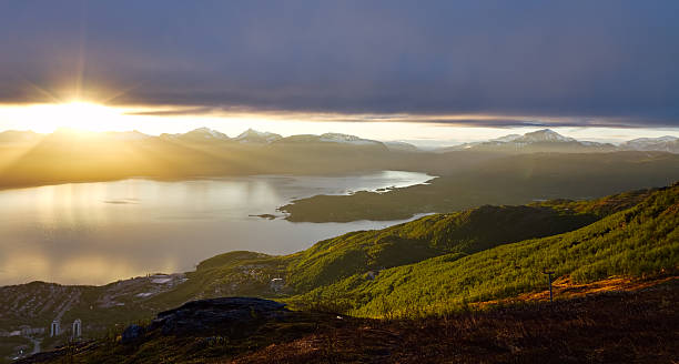 Midnight Sun, Narvik, Norway Midnight Sun over Ofotfjord, Narvik, Norway midnight sun stock pictures, royalty-free photos & images