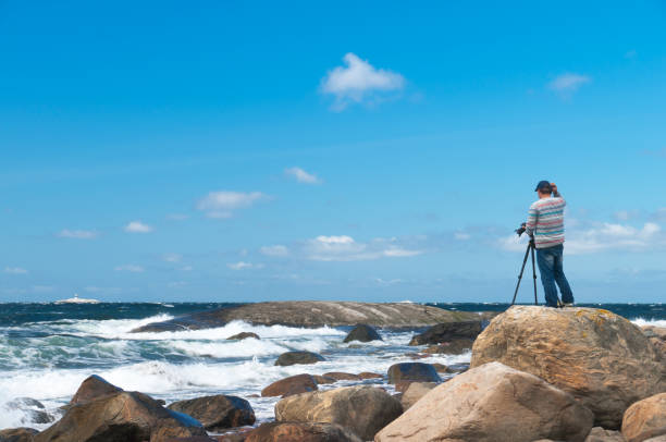 Photographer watching the Ocean
